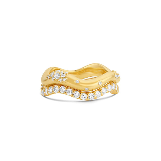 Long Lull Band in 14KY Fairmined Gold with diamonds, shown in stack with Shimmering Tides Wave Ring Moonglow